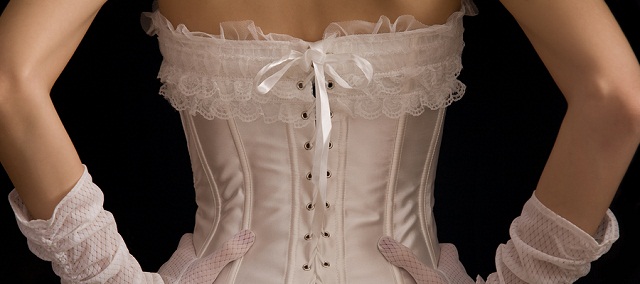 Rear view of girl in white corset